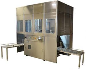 Solvac Automatic hermetically sealed vapour/liquid cleaning system conveyor fed.